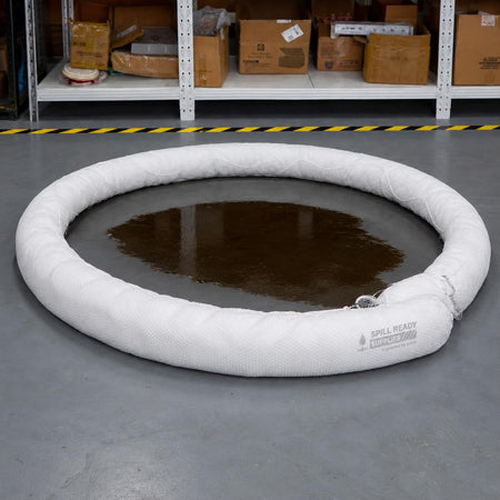 Oil absorbent boom marine deployment